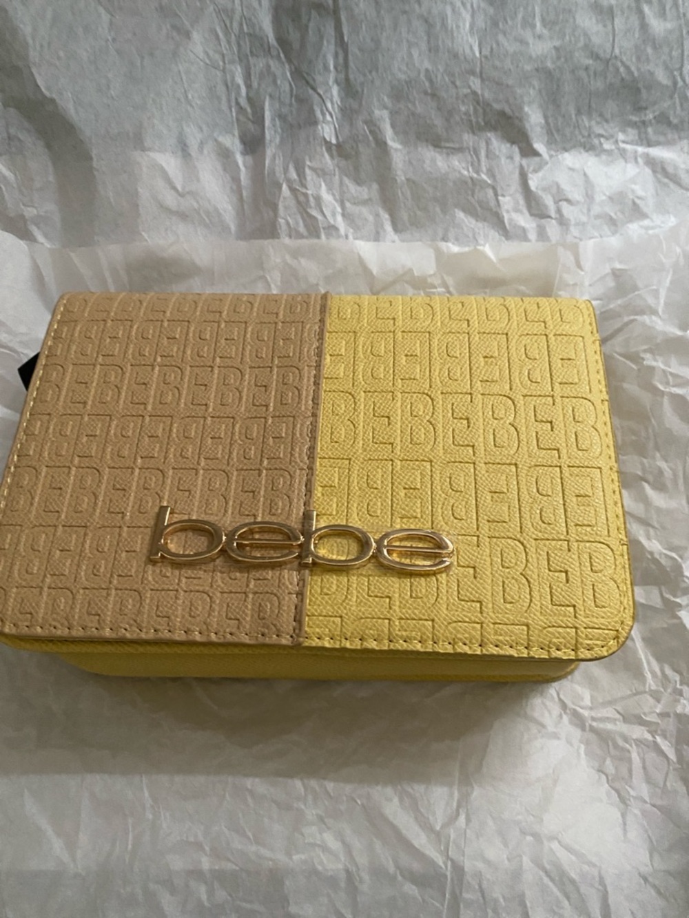 bebe Two-Tone Yellow and Beige Embossed Logo Crossbody Bag